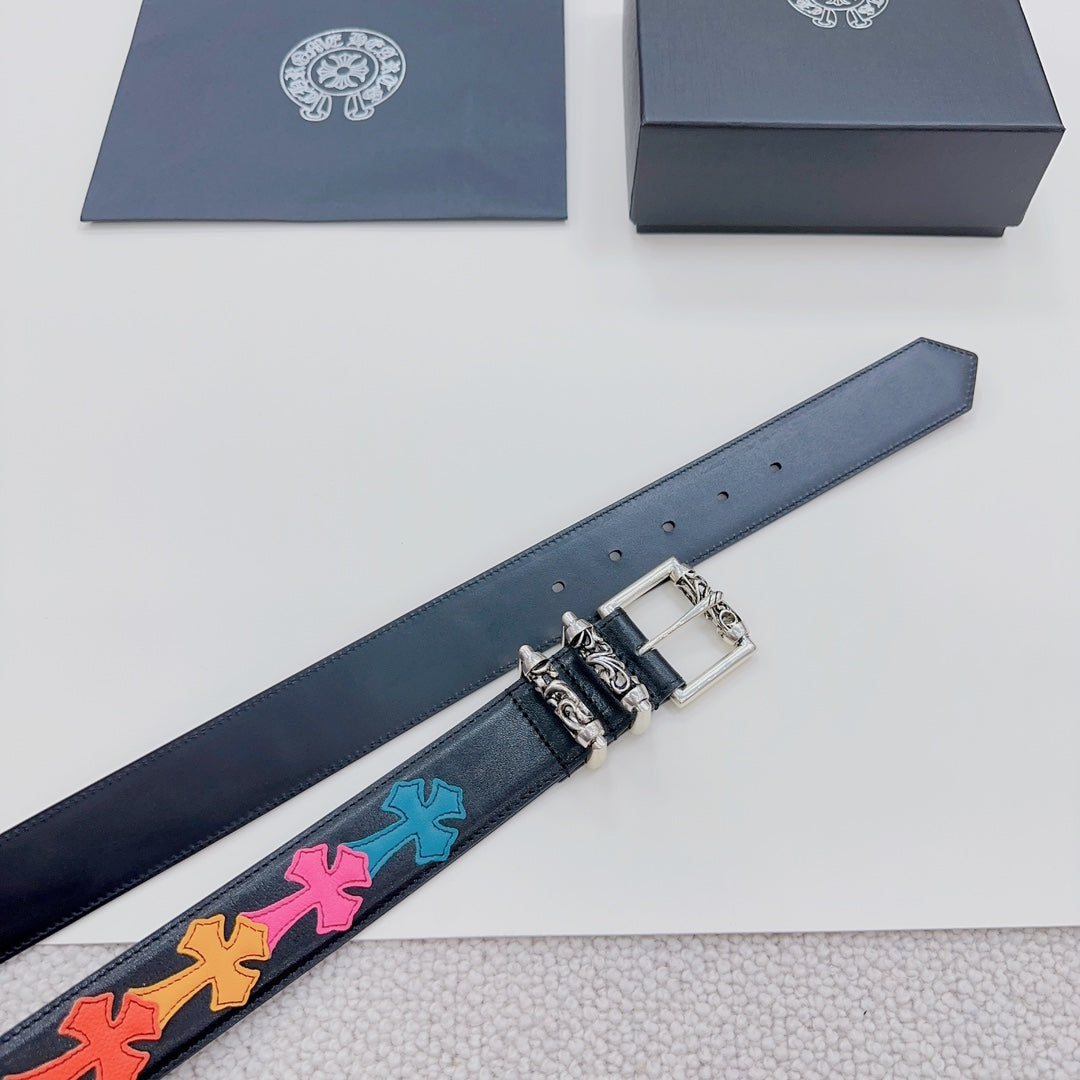 Chrome belt side view: dark blue leather with colorful star motif and silver buckle hardware