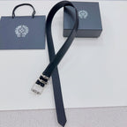 Dark leather belt with silver buckle and ornate metal keeper detail