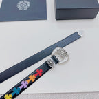 Dark blue leather belt detail with silver buckle and multicolor cross-pattern strip on strap.