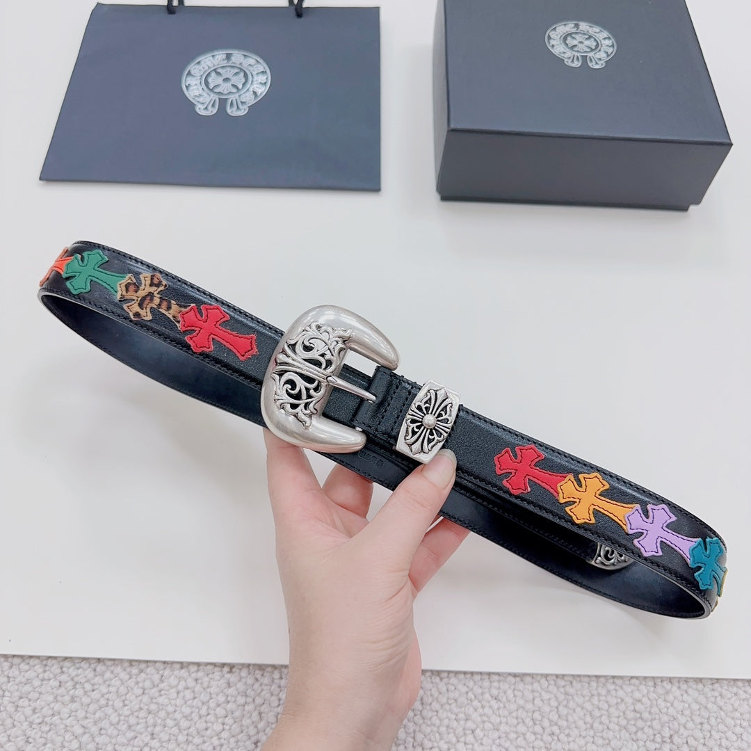 Dark blue belt with ornate silver buckle and multicolor cross inlays, shown at an angle.