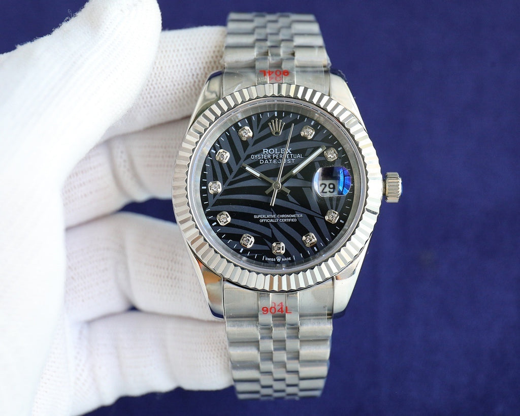 Rolex watch with black dial, silver bezel and steel metal bracelet
