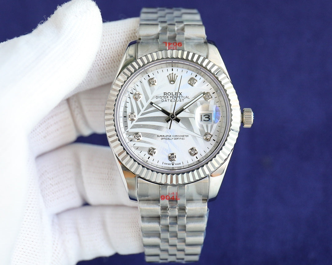 Rolex watch with white dial, silver bezel and steel metal bracelet