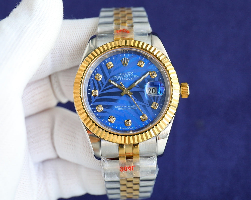 Rolex watch with blue dial, gold bezel and two-tone metal bracelet