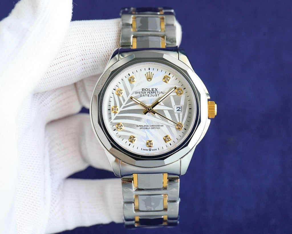 Rolex Datejust watch with white dial and gold accents, two-tone steel bracelet
