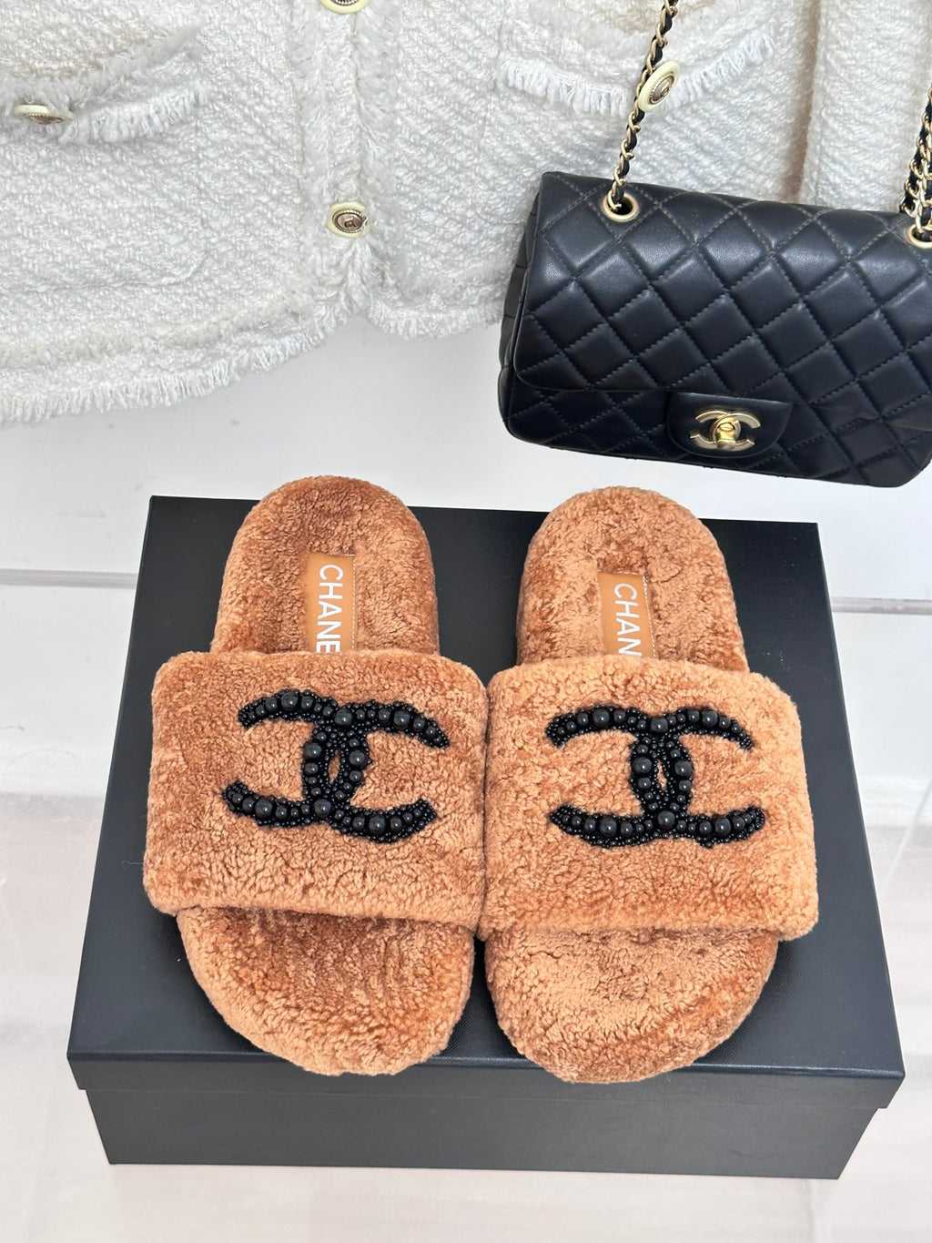 Brown teddy slide sandals with black beaded CC logo on top, CHANEL inside