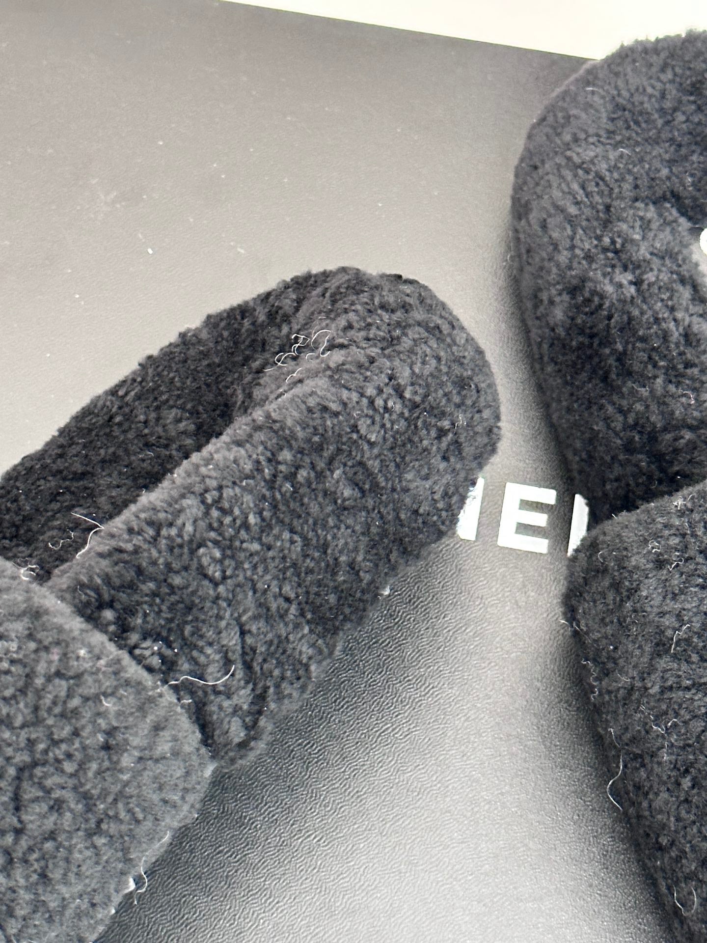 Women's dark navy plush CHANEL slides, textured fabric toe strap