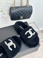 Women's dark navy CHANEL teddy slides on box, white CC logo