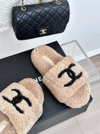 Beige sherpa slides with black beaded logo on strap, womens luxury shoes