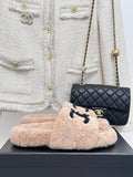 Beige plush shearling slides with black beaded logo strap, womens luxury shoes