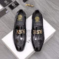 Versace black patent leather loafer with gold logo buckle detail and glossy finish