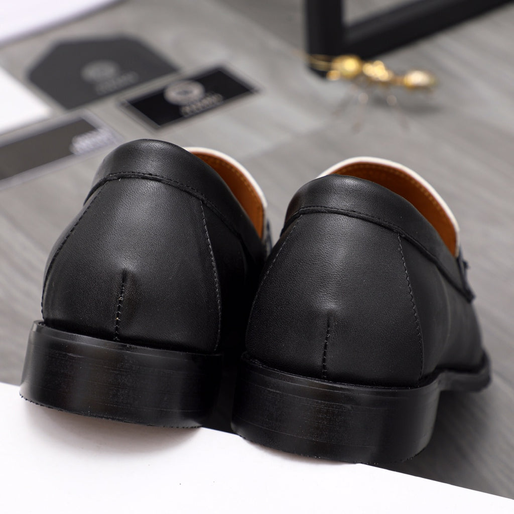 Versace loafer shoes, black leather with rounded heel and stitched seams