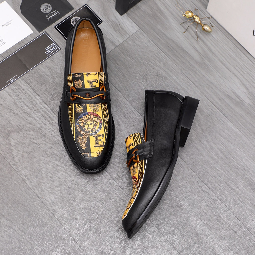 Versace loafer shoes in black with gold patterned vamp and strap buckle