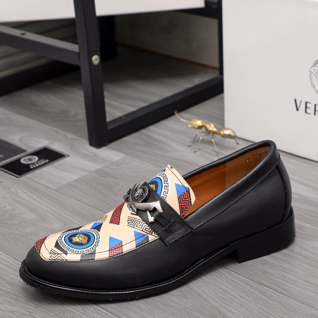 Versace black leather loafers with multicolor geometric slip-on upper and bow buckle