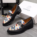 Versace black leather loafers with multicolor geometric vamp detail and buckle