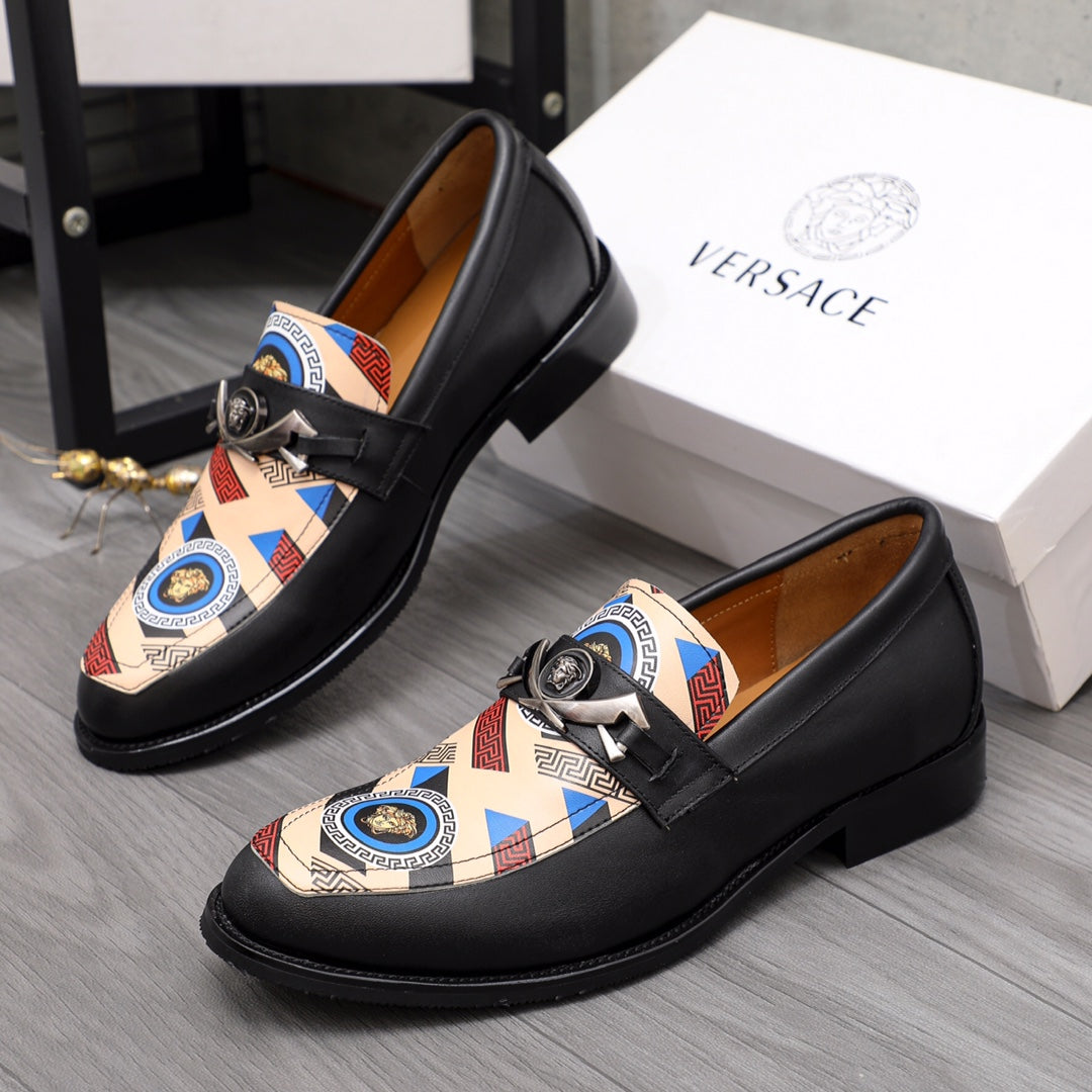 Versace black leather loafers with multicolor geometric vamp detail and buckle