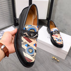 Versace black leather loafer with patterned interior strap and round medallion emblem