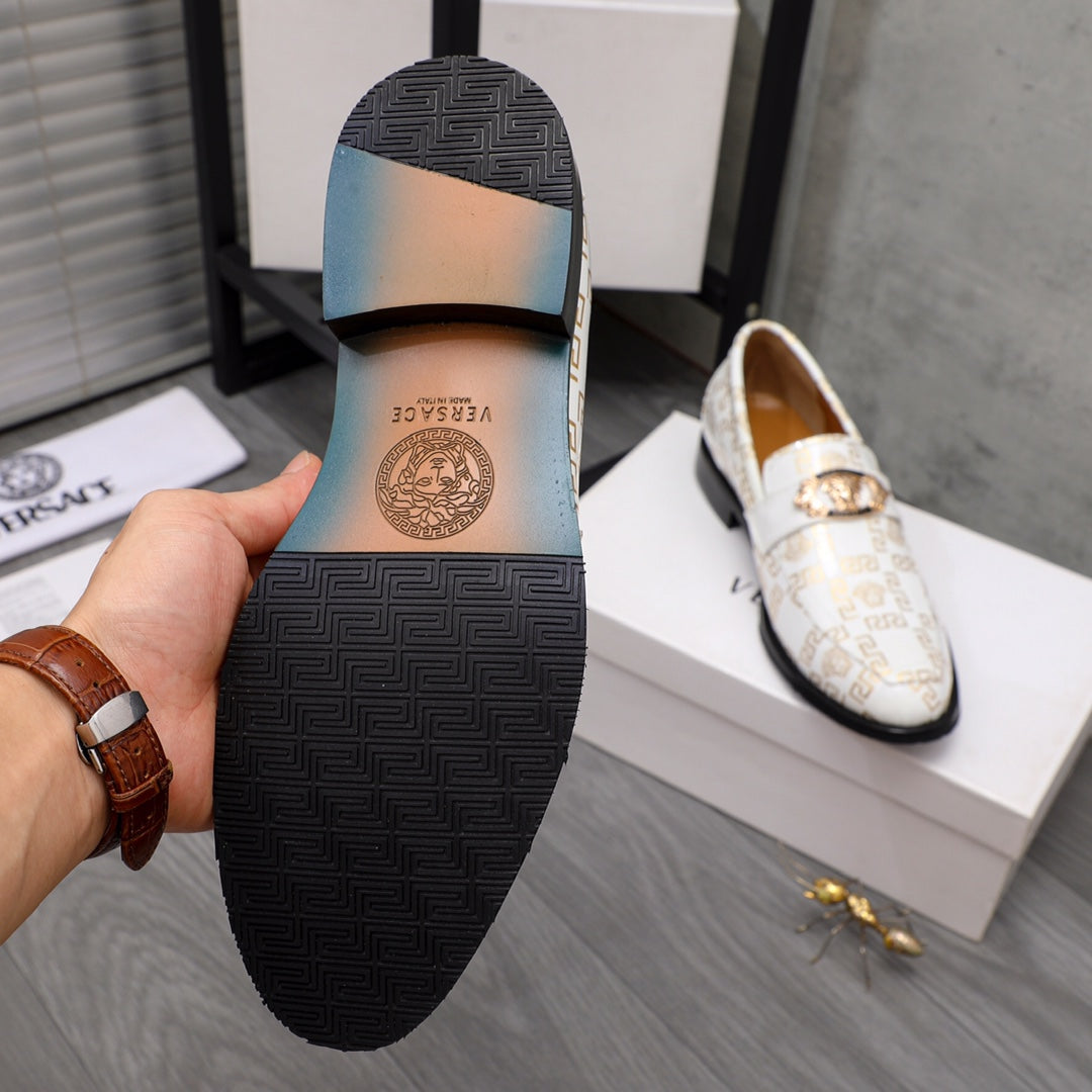 Versace luxury shoes, black textured outsole with raised tread detail