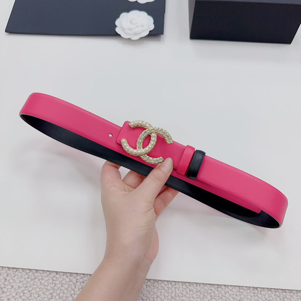 Pink leather belt with gold-tone CC buckle, black accent strap detail