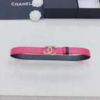 Pink leather belt with gold-tone CC buckle and black underside