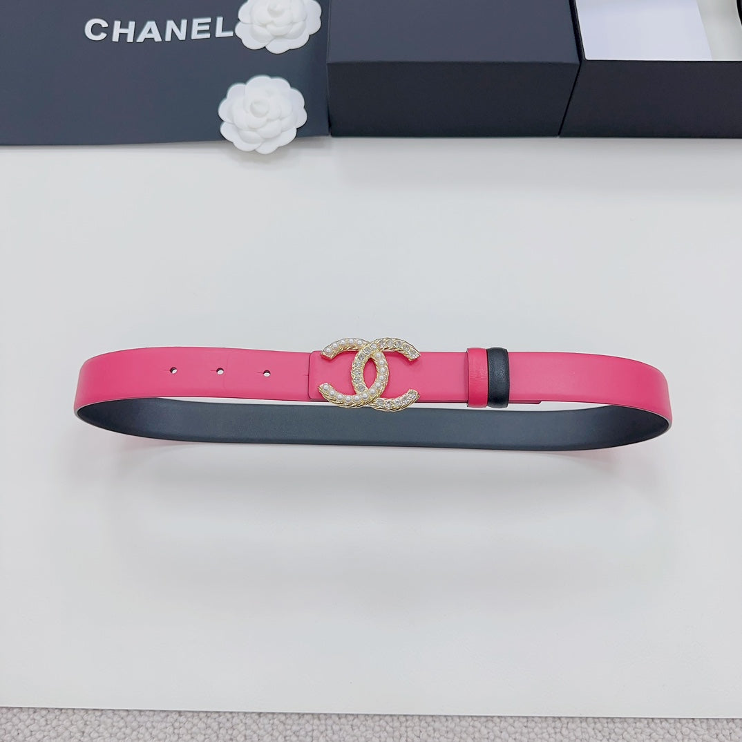 Pink leather belt with gold-tone CC buckle and black underside