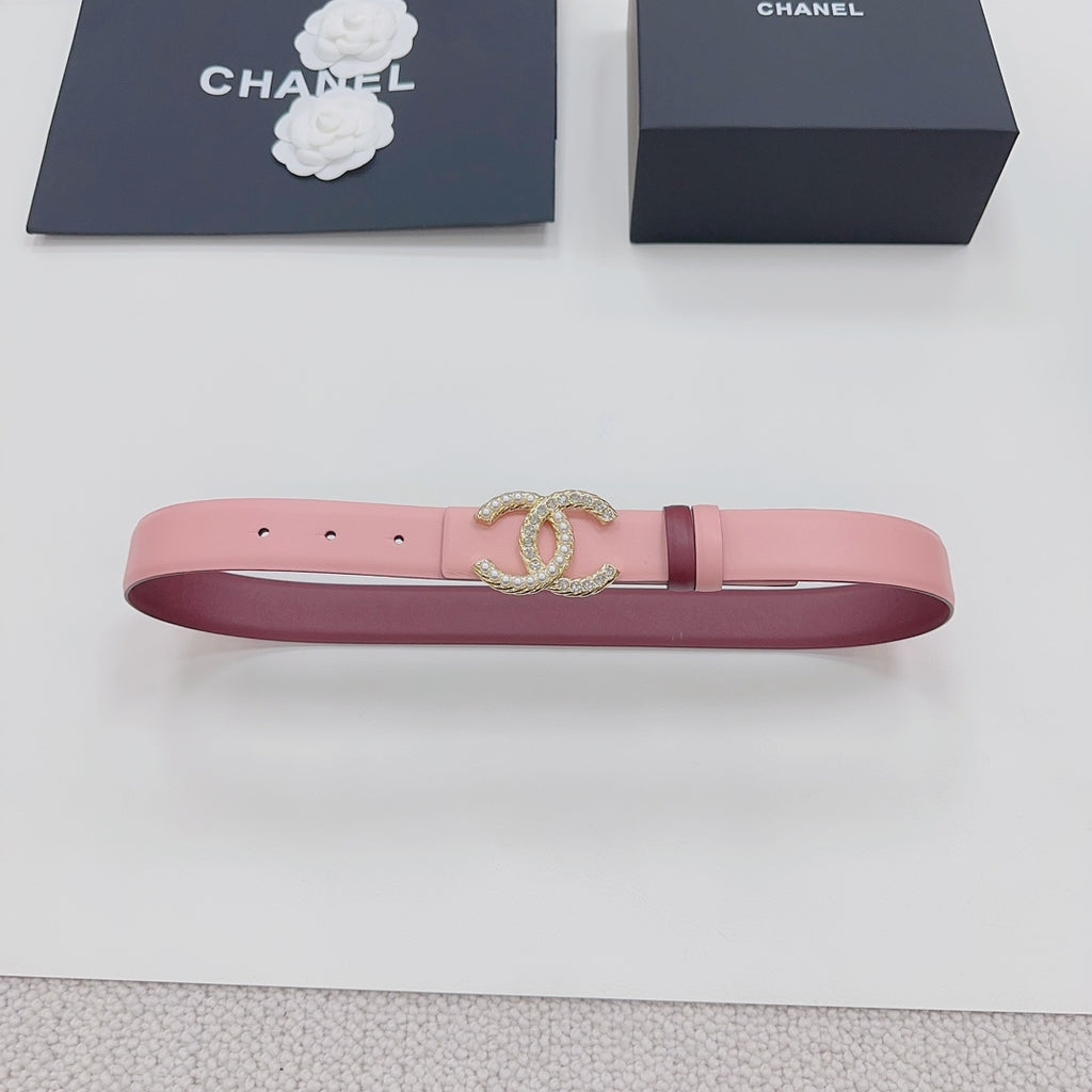 Pink Chanel belt with gold-tone CC buckle and punched strap holes