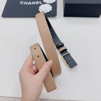 Tan belt with navy end panel and gold-tone double-C charm detail