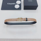 Tan leather belt with navy underside and gold-tone double-C crystal buckle