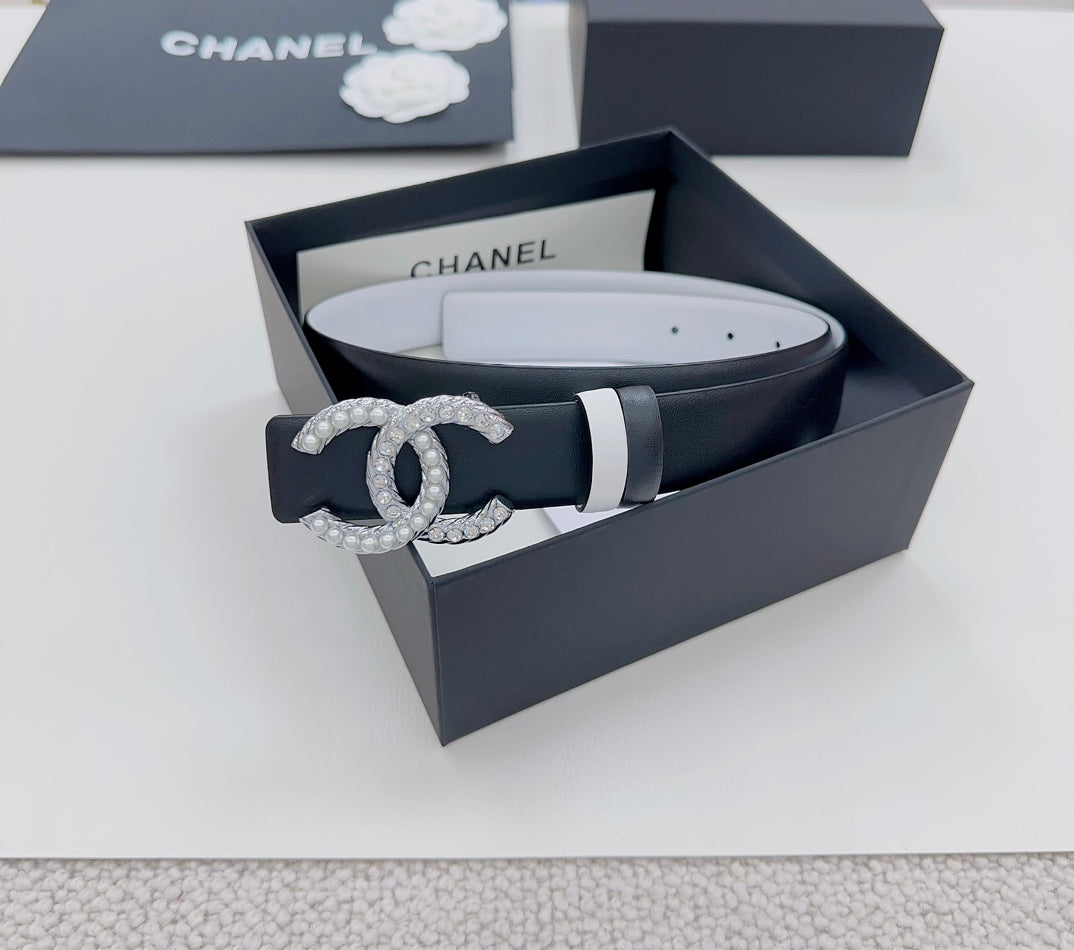 Dark leather belt with silver rhinestone CC buckle and silver buckle bars