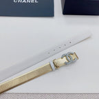 Gold-tone belt strap with silver CC rhinestone buckle and hanging tag