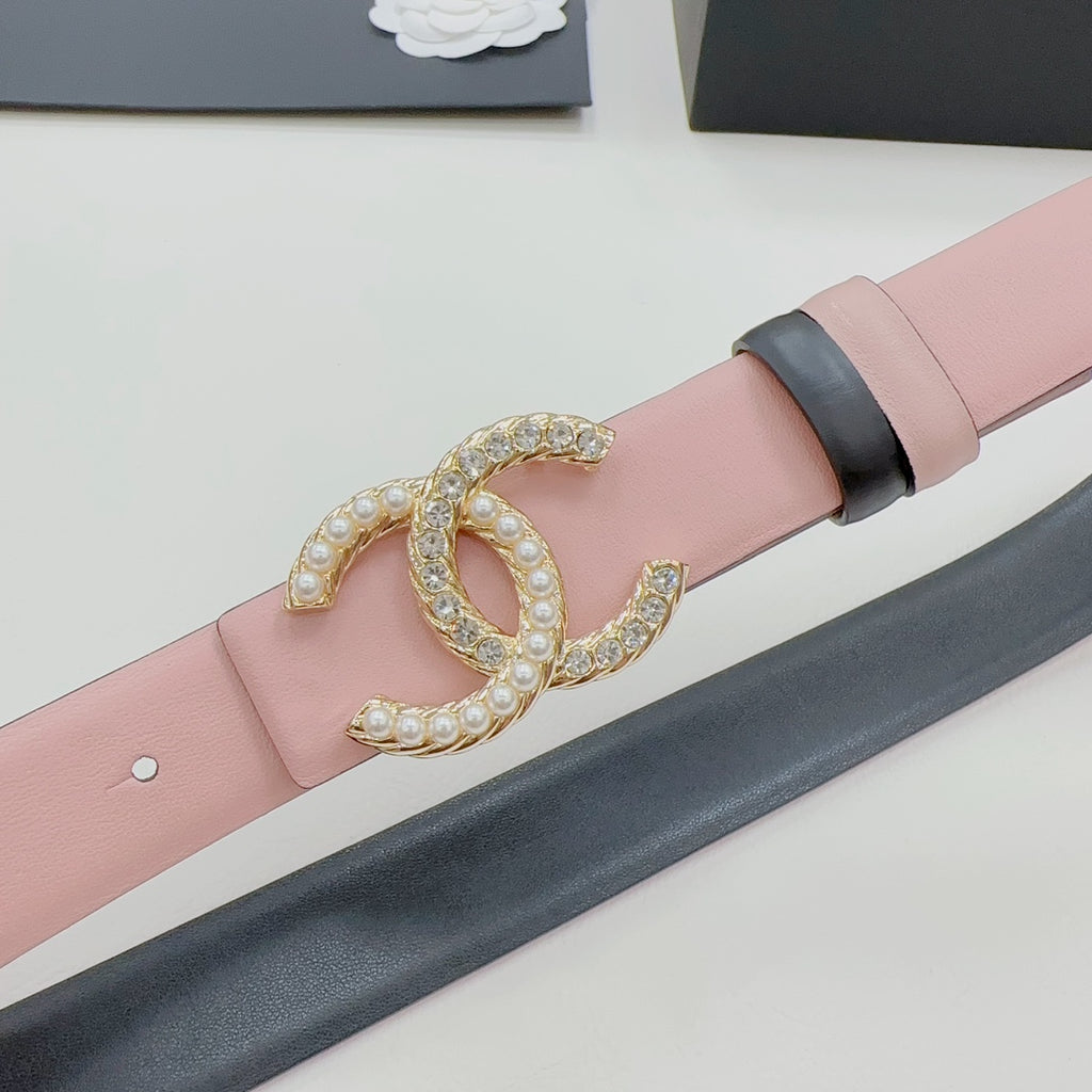 Gold faux-pearl double C buckle on pink leather belt with dark side band