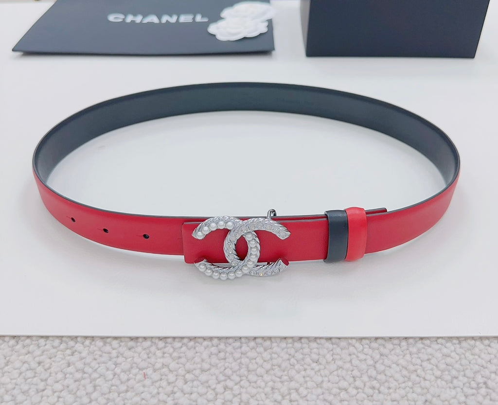 Chanel leather belt, red with silver CC buckle, black edge and keepers.