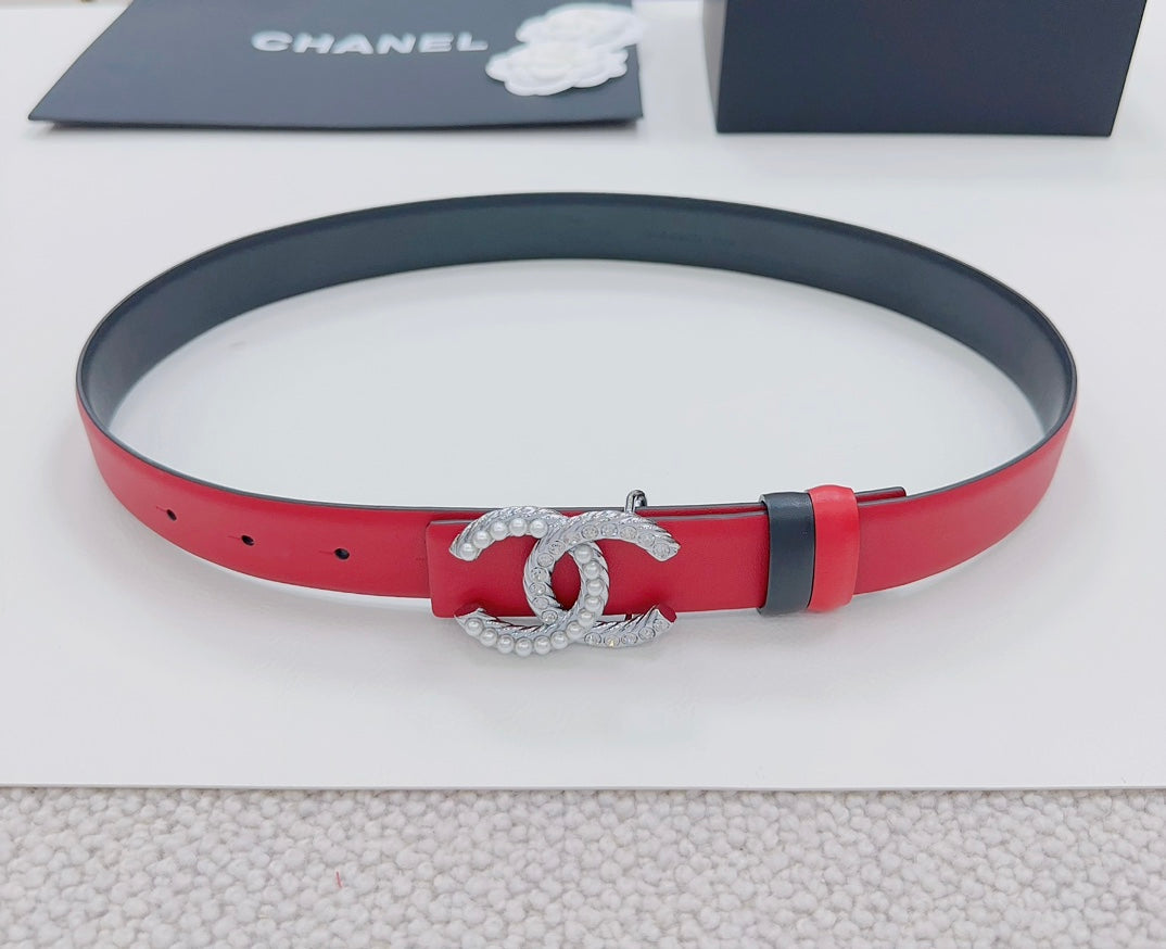 Chanel leather belt, red with silver CC buckle, black edge and keepers.