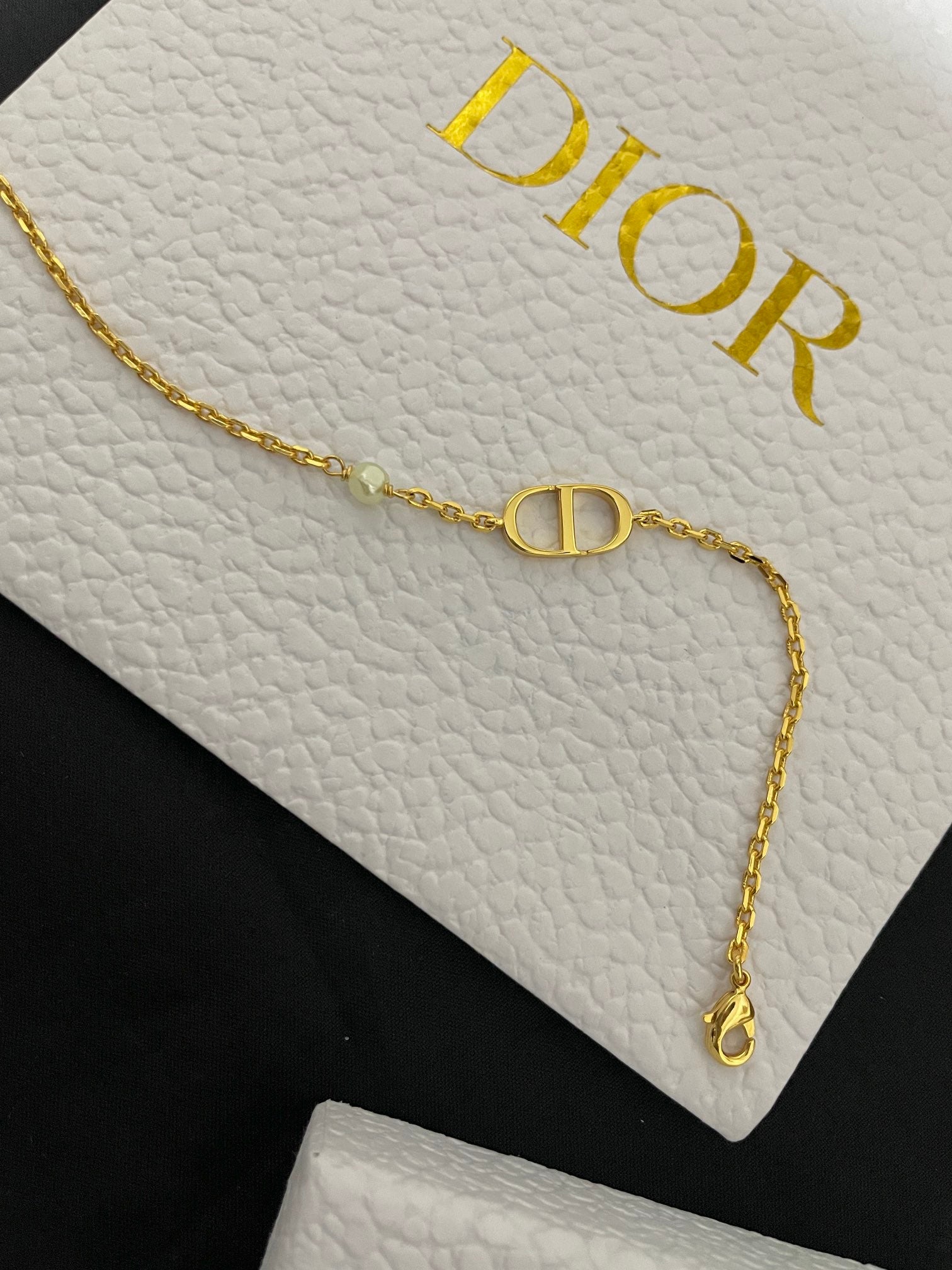 Gold-tone chain necklace with Dior D pendant and dangling charm