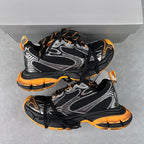 Balenciaga unisex chunky sneakers, black mesh with silver panels and orange soles