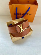 Louis Vuitton belt in brown with embossed monogram and gold-tone LV buckle