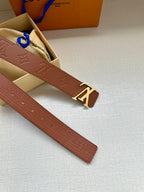 Louis Vuitton brown belt with embossed monogram strap and gold-tone buckle detail