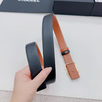 Chanel belt with ends shown: dark strap and tan leather panel with gold-tone buckle