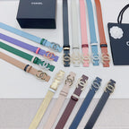 Embellished Chanel belts assortment with colorful straps and gold-tone stone buckles.