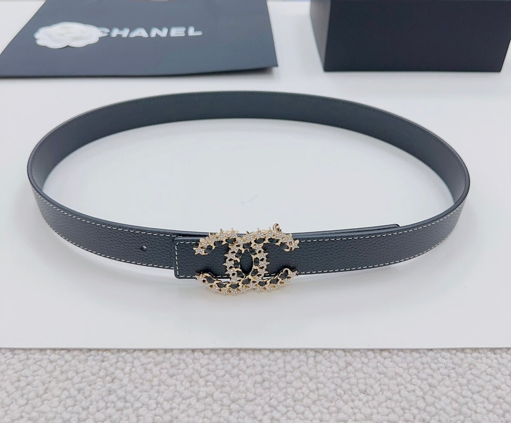 Navy leather belt with gold-tone logo buckle and single adjustable strap holes