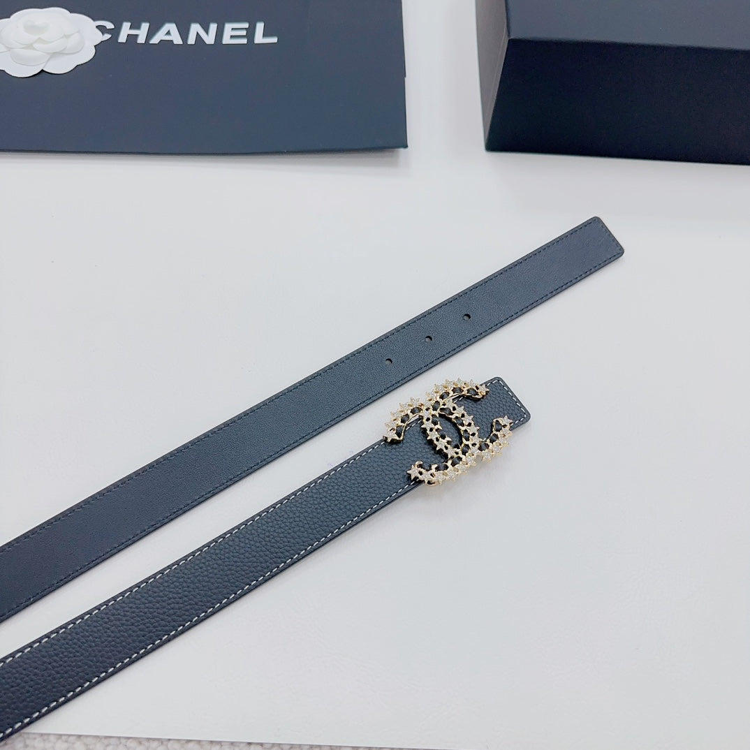 Navy leather belt strap with gold-tone logo buckle; includes visible adjustment holes