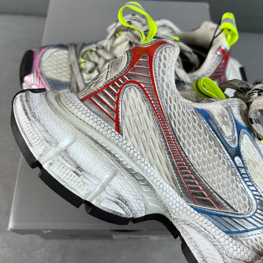 Unisex sneakers heel and side, white textured panels with blue detail, red stripe and neon green tabs