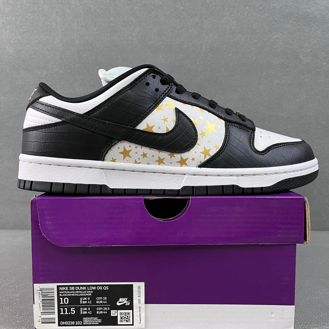 Black and white low-top sneakers with gold star print and black Nike Swoosh