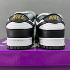 Black and white low-top sneakers with NIKE heel logo and white midsole