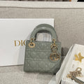 Dior handbag, sage green quilted patent leather, top handle, gold-tone hardware