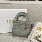 Dior handbag, sage green quilted patent leather, top handle, gold-tone hardware