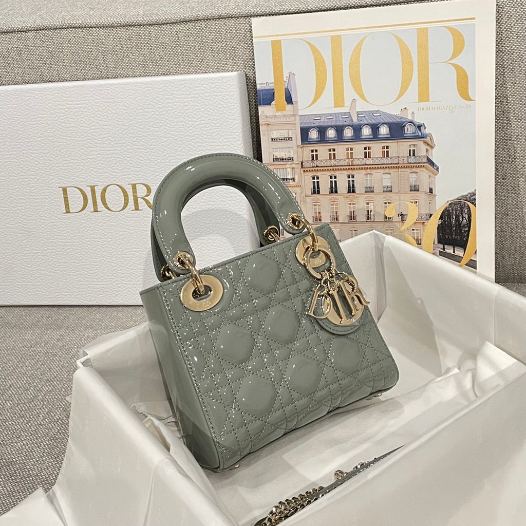 Sage green quilted patent handbag with top handle and Dior charm, gold hardware