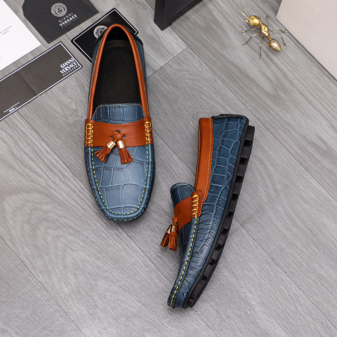 Versace blue tassel loafers with orange trim, showing front and side views