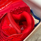Louis Vuitton red trainer sneaker close-up of insole and lace-up interior