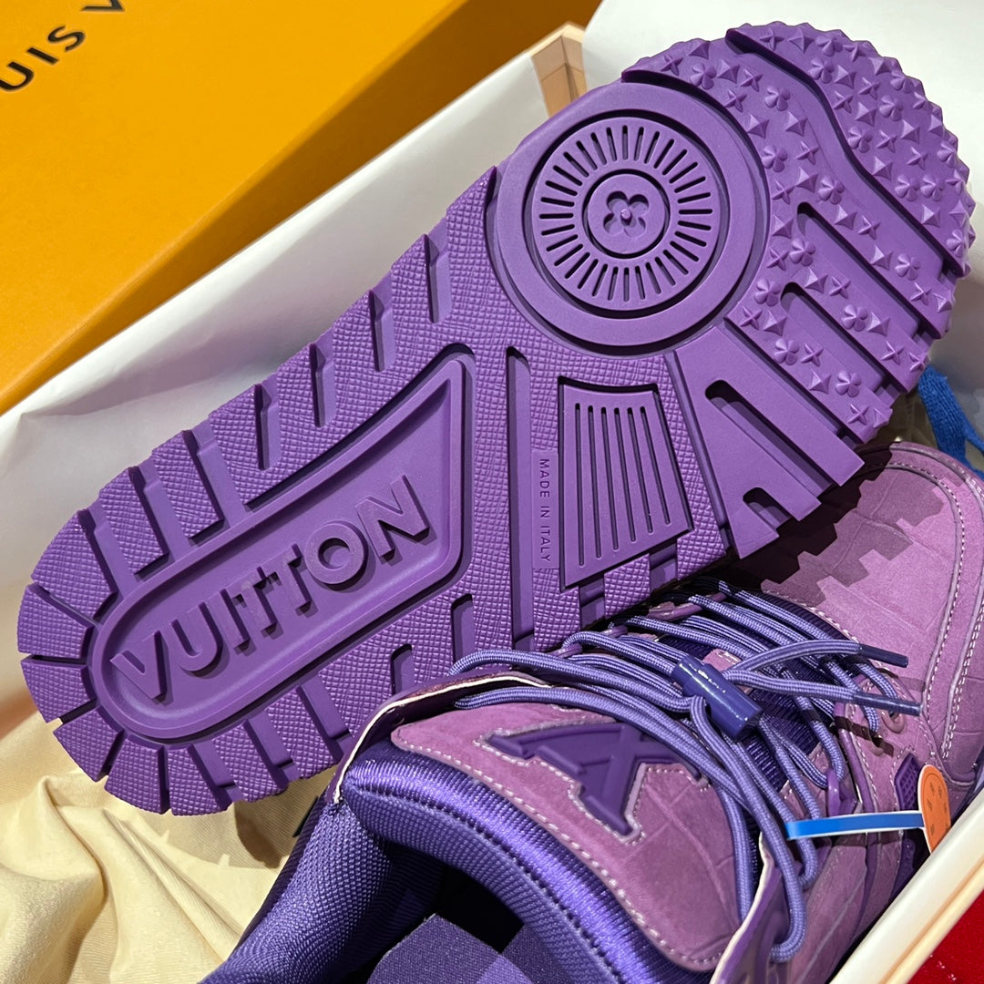 Purple Louis Vuitton trainer shoe outsole with “vuitton” print and tread details