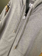 Heather gray zip-up hoodie with two-way front zipper and kangaroo pocket